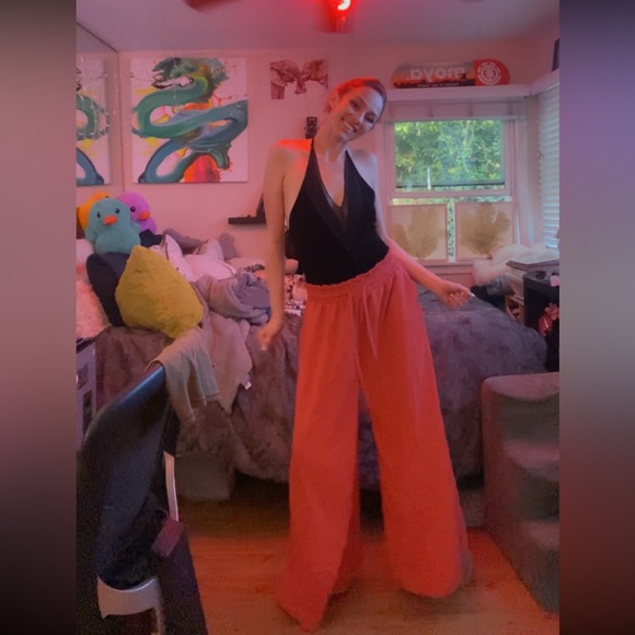 Elegant Black Top with Flowing Coral Pants - Picture 13 of 17